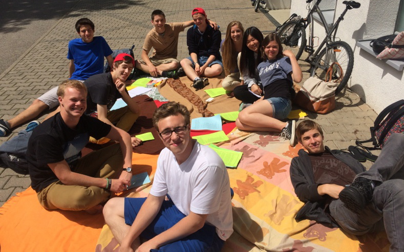 Period Five enjoying sunshine at our Literary Picnic on the last day of school.
