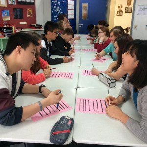 With "speed dating" interviews, students gather information for their college essays.