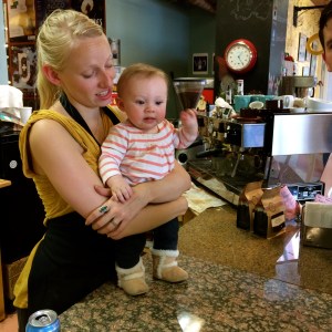 Luci practices her standing with Aunt Holly at the bakery.